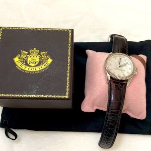 Pearl display with black leather straps